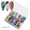 Set di fogli per nail art con 10 motivi laser cielo stellato in una scatola trasparente - Fiori Astratti Pittura a Olio (TZ0284-09)