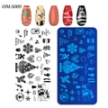 Kerst nail art stempelplaat OM-S009 met patronen van rendieren en sneeuwvlokken - Kerstman Rendier Stijl (OM-S009)