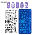 Christmas nail art stamping plate OM-S003 with reindeer and snowflake patterns - Christmas Ferris Wheel Teddy Bear Style (OM-S003)