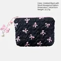 Quilted black pouch with pink bow print, pearl charm, and 14x2x10cm size details - Black/Pink Bow Hexagonal Mini Pouch