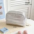 Silver puffer cosmetic bag with quilted texture, size 21x8x14cm and 140g lightweight design - Silver