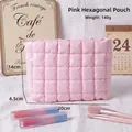 Pink quilted puffer cosmetic bag with grid texture, measuring 20x14x4.5cm and weighing 140g - Pink