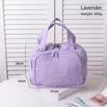 Quilted cotton makeup bag in dark violet with handle for portable travel storage - Dark Violet