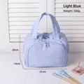 Quilted light blue cotton makeup bag with handles and double zippers for travel - Light Blue