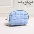 Light blue glossy quilted semicircular makeup bag with silver zipper in compact size - Small Semi-circle Blue
