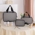 Three-piece set of grey mesh cosmetic bags in various sizes for travel storage - Three-Piece Set / Black