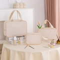 Three-piece set of cream white honeycomb textured makeup bags for travel storage - Three-Piece Set / Off White