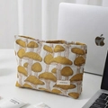 Linen makeup bag with yellow mushroom patterns and silver zipper for travel storage - Large Yellow Mushroom Style