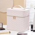Cream PU leather makeup case with chevron quilting and gold zippers for storage - Khaki White