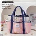Pink large mesh beach bag with blue handles and multiple pockets for travel use - Large / Lotus root pink
