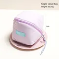 Pastel purple cloud makeup bag featuring quilted texture and miloBLISS woven label - Light Purple