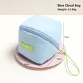 Blue cloud cosmetic bag in sky blue fabric with neon green strap and zipper detail - Light Blue