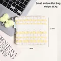 Mini neceser de maquillaje a rayas amarillas y blancas con encaje, 14 cm x 13,5 cm - Amarillo