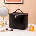 Large black leather makeup bag with dual gold zippers and top handle for travel - Classic Black