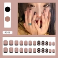 Detail view of R266 French style nude press-on nails with black tip and checkerboard design - French Checkerboard (LF042)