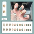 Press-on nail set featuring green heart, cow print, and 3D bow designs in a 24-piece pack - Matcha Butterfly Style (Z055)