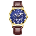 Dettaglio della cassa dorata con quadrante blu scheletrato e cinturino in pelle marrone - Cinturino in Pelle Scheletrato-Cassa Oro Quadrante Blu