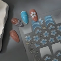 Blue gradient floral nail stickers with gold accents and 3D shell texture effects - Blue Gradient Embossed Flowers (CO-519)