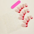 Detail of red French tip press-on nails set with gold star accents and prep tools - Red French Style with Gold Patterns (XH-13-09)
