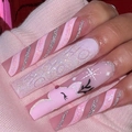 Macro view of Christmas press on nails with pink coffin shape and glitter reindeer art - Pink Reindeer Embossed Style (XD-80-85)