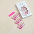 Detail of pink XO lip print coffin nails with adhesive tabs and nail file in packaging - Extra Long Pink French Lip Print Style (XA-70-71)