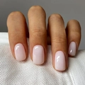 Glossy nude pink short square round press-on nails shown on a soft woven texture - Light Pink (XC-40-87)