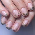 Christmas reindeer press-on nails with gold antlers and green leaf designs on pink base - Transparent Pink Reindeer Gold Antler Oval Style (XH-21-07)