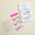 Detail of nude pink almond press-on nails with blue heart patterns and packaging kit - Pink Base Blue Heart Style (XE-94-16)