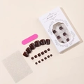 Macro detail of wine red press-on toenails kit with file and adhesive glue stickers - Wine Red (XD-93-67)