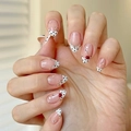 Uñas postizas de almendra con puntas blancas, puntos negros y patrones de cerezas - Estilo de Diamantes de Imitación de Cereza con Lunares Franceses en Rosa Nude