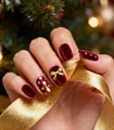 Velvet burgundy press on nails with gold bow accent and festive Christmas tree background - Burgundy Velvet Gold Butterfly Xmas Tree Style (1XG2-13539)
