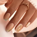 Nude almond press-on nails with gold glitter and French line art shown on hand - Nude Glitter French Style (XA-100-90)