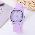 Detail view of a purple square dial quartz watch with a matte silicone strap and Arabic numbers - Purple