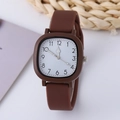Detail of square quartz watch featuring a clear white dial and brown matte silicone strap - Dark Coffee