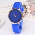 Fashionable blue silicone strap quartz watch with rose gold case in an elegant setting - Blue