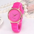 Detail of rose pink silicone watch with geometric texture and gold metal case - Rose Red