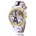 Montre quartz pour femme avec lunette dorée diamants, cadran Tour Eiffel et bracelet blanc - Blanc