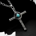 Vintage silver cross necklace with intricate carvings and green stone on black background - Retro Carved Inlaid Synthetic Turquoise Cross Style (E33204-1)