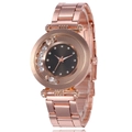 Detail of rose gold quartz watch featuring floating crystals and a sunray grey dial - Black
