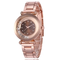 Close-up of rose gold watch with deep brown gradient dial and sliding rhinestones - Coffee