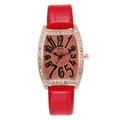 Detail view of the rose gold tonneau-shaped watch case with sparkling crystal bezel - Red