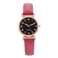 Detail of rose gold quartz watch with starry dial and magenta leather strap on white background - Burgundy