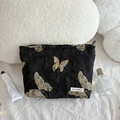 Detail of black makeup bag with gold butterfly embroidery and texture fabric - Gold Thread Butterfly Cosmetic Bag (Large)