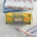 Close-up of yellow and purple plaid canvas pencil case with zipper and May Rabbit label - Yellow Purple Plaid