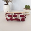 Close-up of jacquard pencil case with red mushroom patterns and May Rabbit fabric label - Red Mushroom / Pencil Case