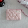 Detailed view of pink quilted coin purse with cloud pattern and woven wrist strap - Quilted Cloud Pink