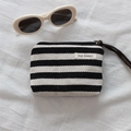 Detail of striped fabric coin purse with durable zipper and woven wrist strap - Black Stripe