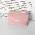 Detail of pink corduroy pencil pouch with silver ring zipper and May Rabbit label - Light Pink