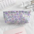 Close-up of small floral canvas makeup bag with purple roses and metal zipper detail - Purple Pink Camellia Rose