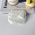 Detail view of a white quilted PU leather coin purse with heart pattern and zipper pocket - Large Heart Rice White